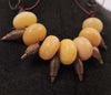 Debe Dohrer Resin Bead Necklace with Coins and Brass Pendants